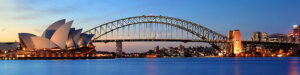 View of Sydney Opera House and Sydney Harbor at sunset